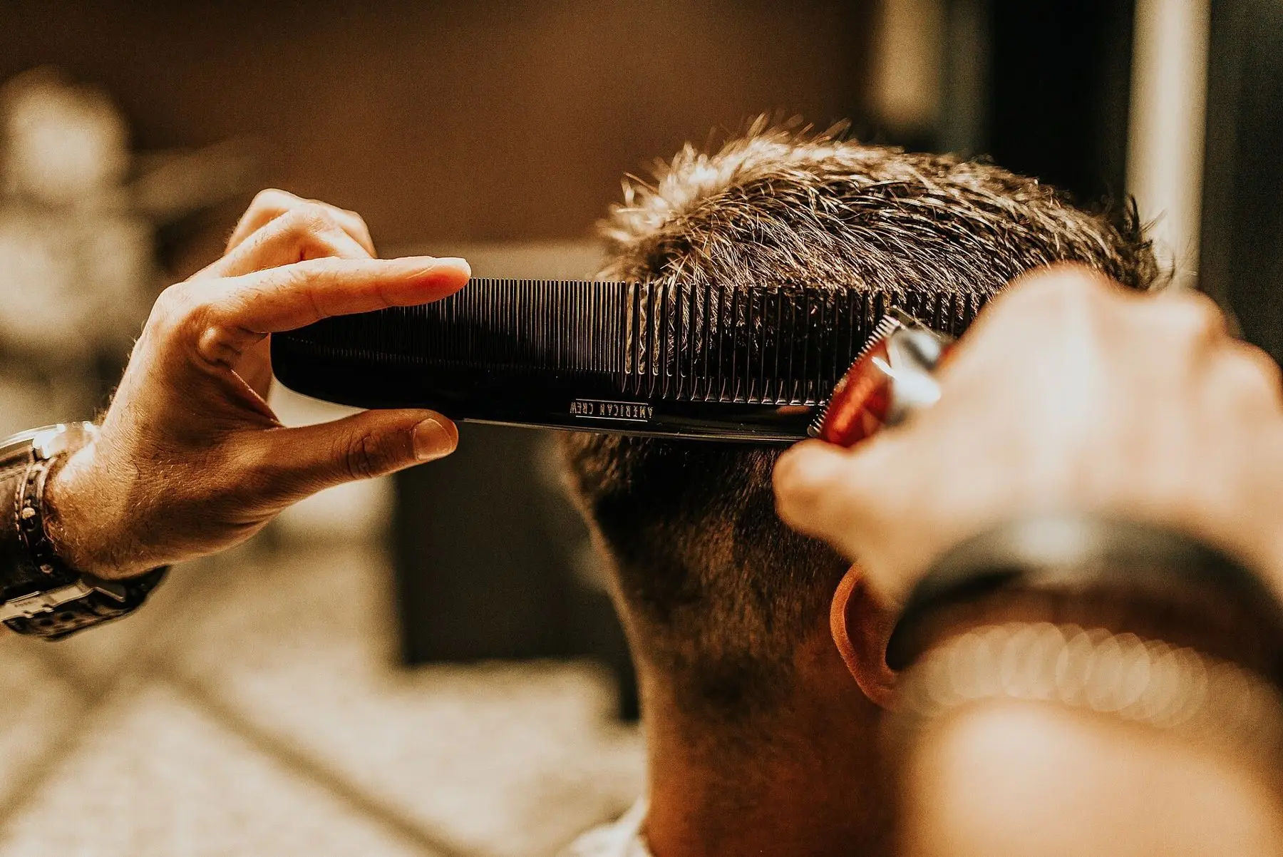 Comb and clipper taking the sides down